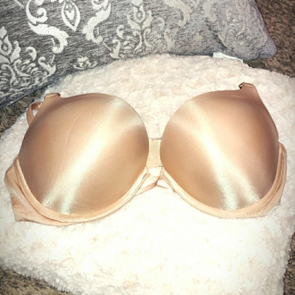 nude Victoria’s Secret bombshell bra.